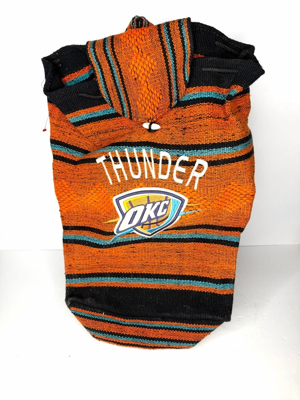 OKC Thunder Orange Striped Knit Hoodie woven serape-style drawstring backpack.
